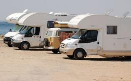 Motor-homes parked up beside a beach