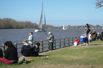 The River Luján, with sailing yachts and fishermen, but very few fish