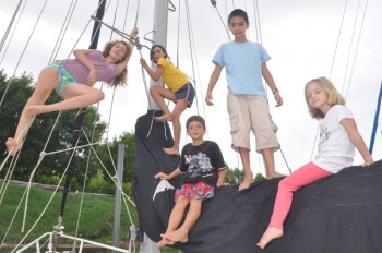 Cruising kids - Roxanne in the rigging with the kids form Suvarov and Saoirse