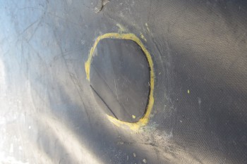 A rubber patch applied 4 months ago to the bottom of the Avon dinghy