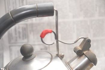Sugru used to insulate the pull ring on the kettles spout