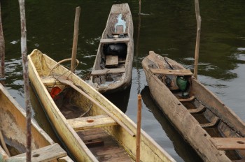 One plank-built canoe with three much-patched dug-outs, any of which could be older than Grand-pa