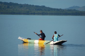 Bahian fishermen in their dug-out canoe