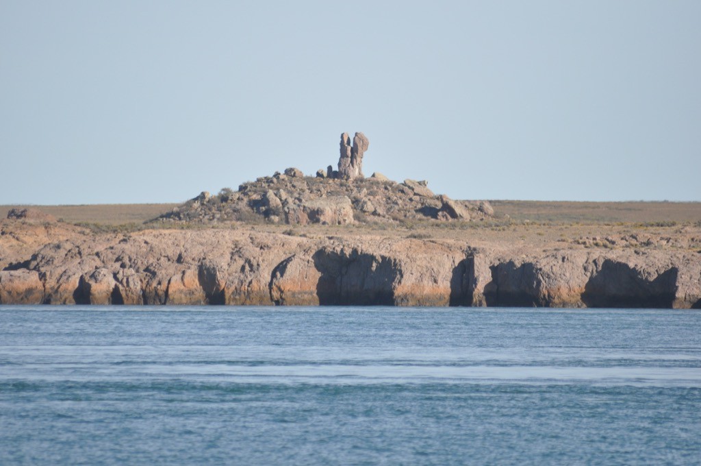 The only prominent feature of the landsacpe is this natural sculpture standing on the opposite shore.
