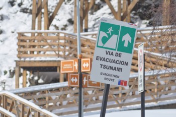 A tsunami evacuation route leads to te nearest high ground